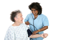 nurse checking blood pressure of an elderly woman